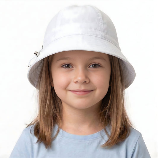 Young girl wearing a white bucket hat on a white background