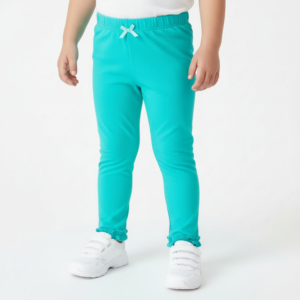 Turquoise pants with ruffled hem on a white background